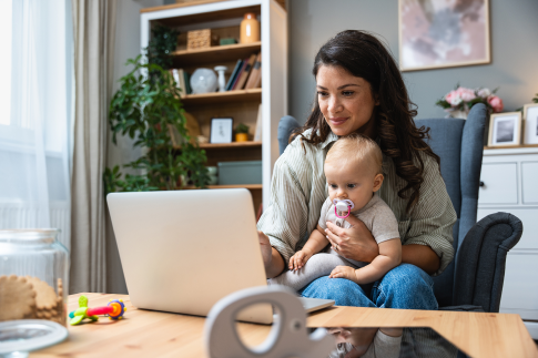 young mother and baby on lap