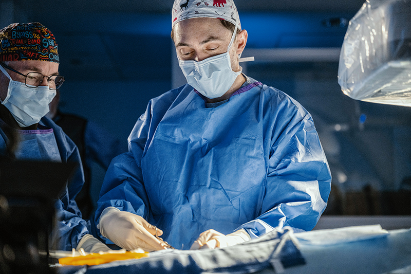 Two surgeons in scrubs in the operating room